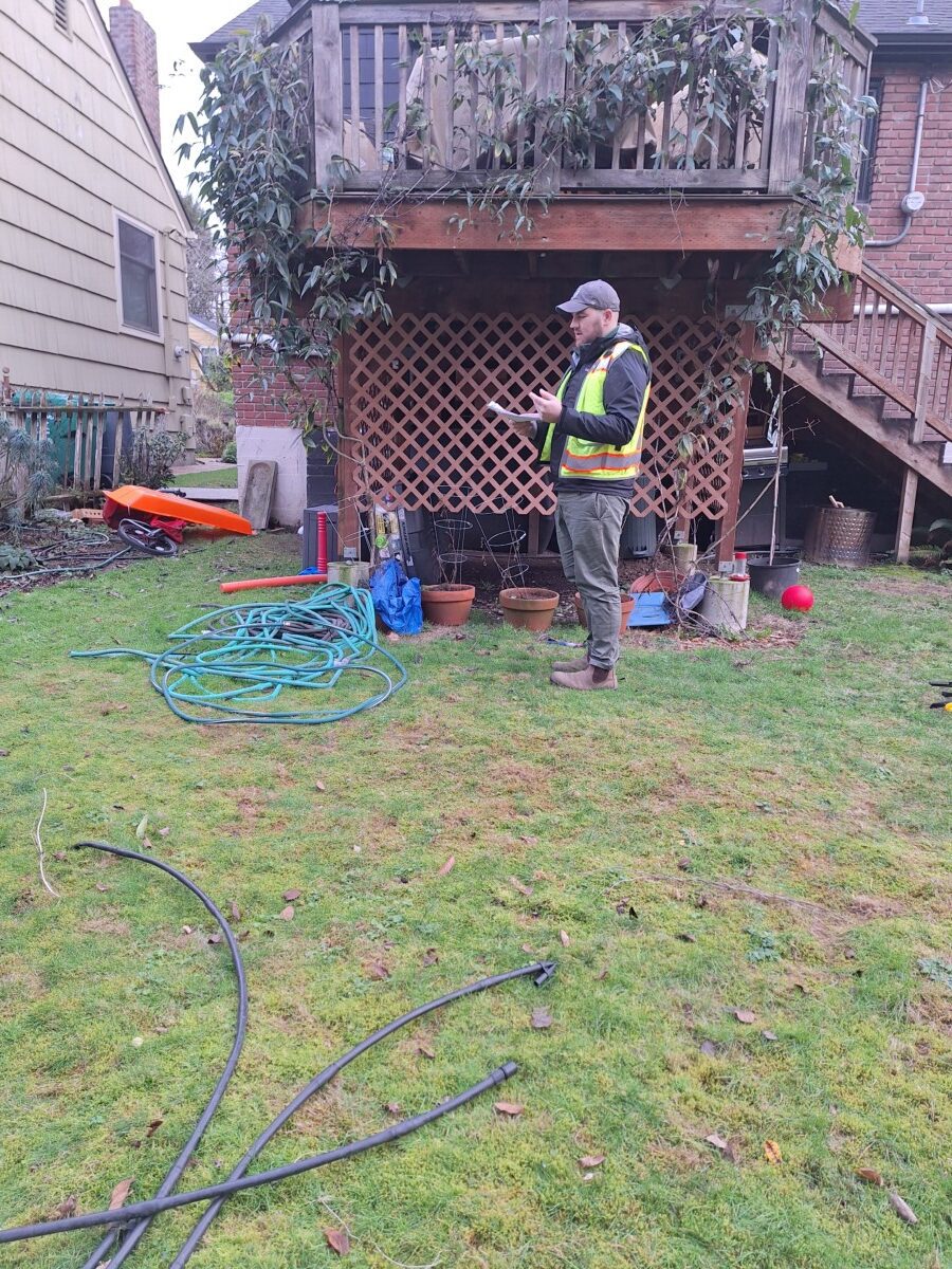 RainWise inspector checking cistern installation and compliance at a Seattle home